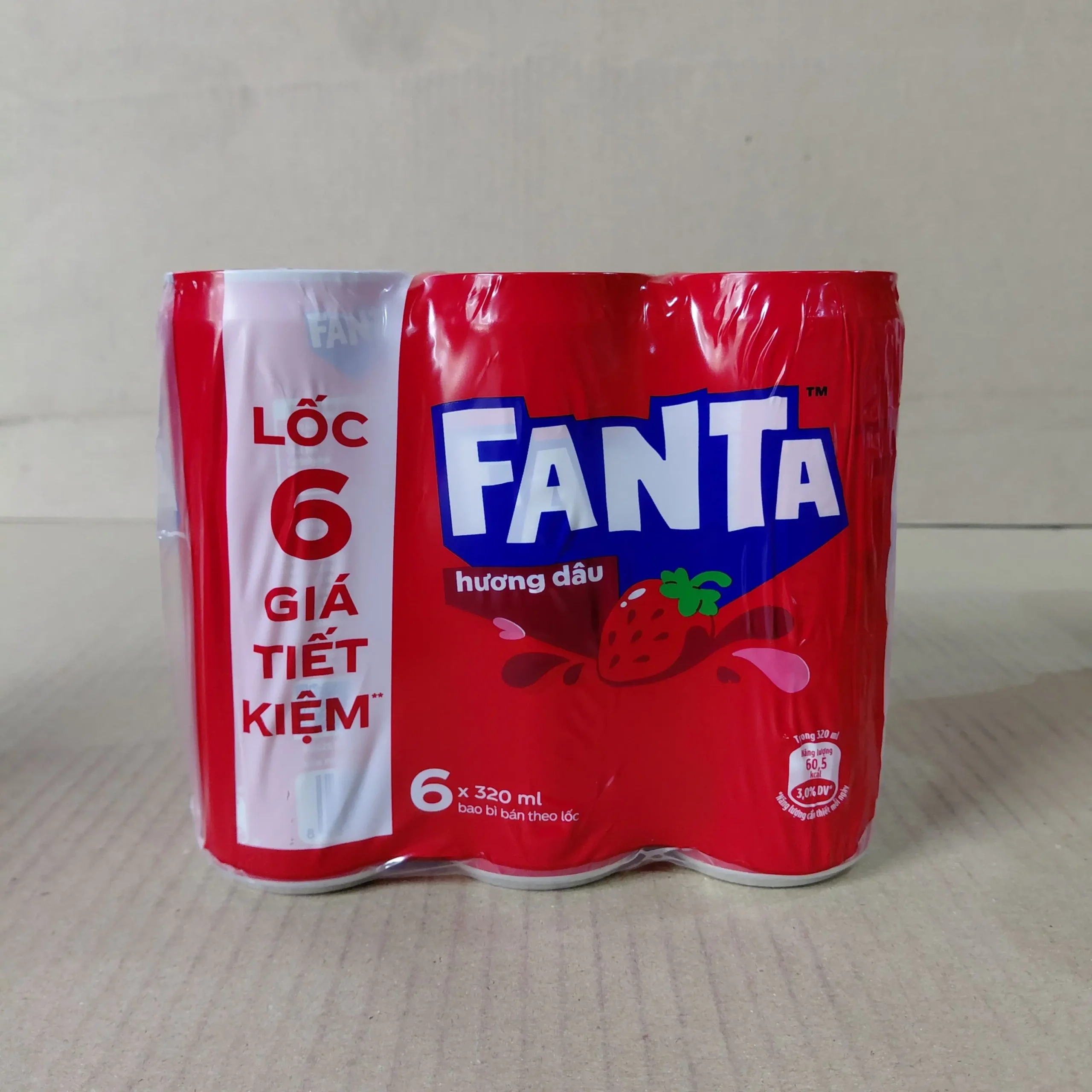 Fanta red can multipack with Vietnamese wording on its wrapper